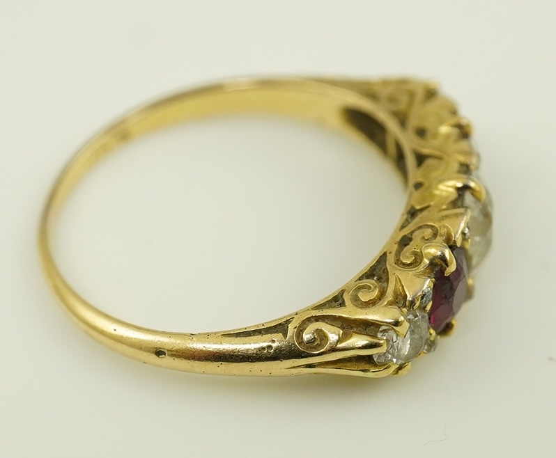 A late Victorian 18ct gold, two stone ruby and three stone diamond set half hoop ring